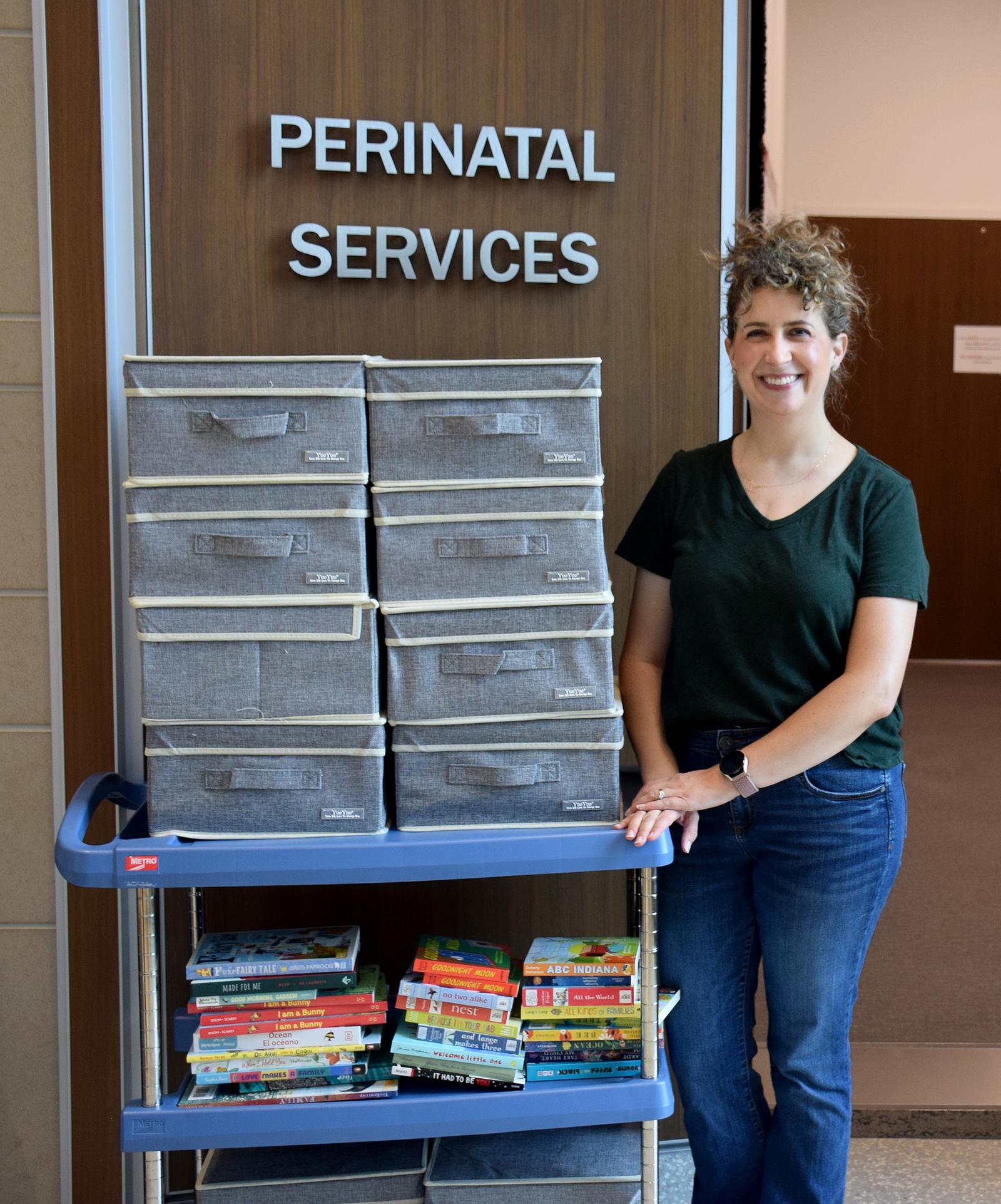 Melissa Nam donating books and memory boxes to IU Health Bloomington Perinatal Services.