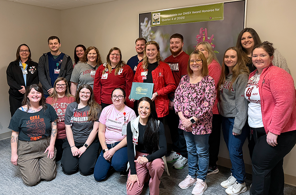 DAISY Award winner Sarah Miller, RN, with her IU Health Primary Care – Landmark team in Bloomington.